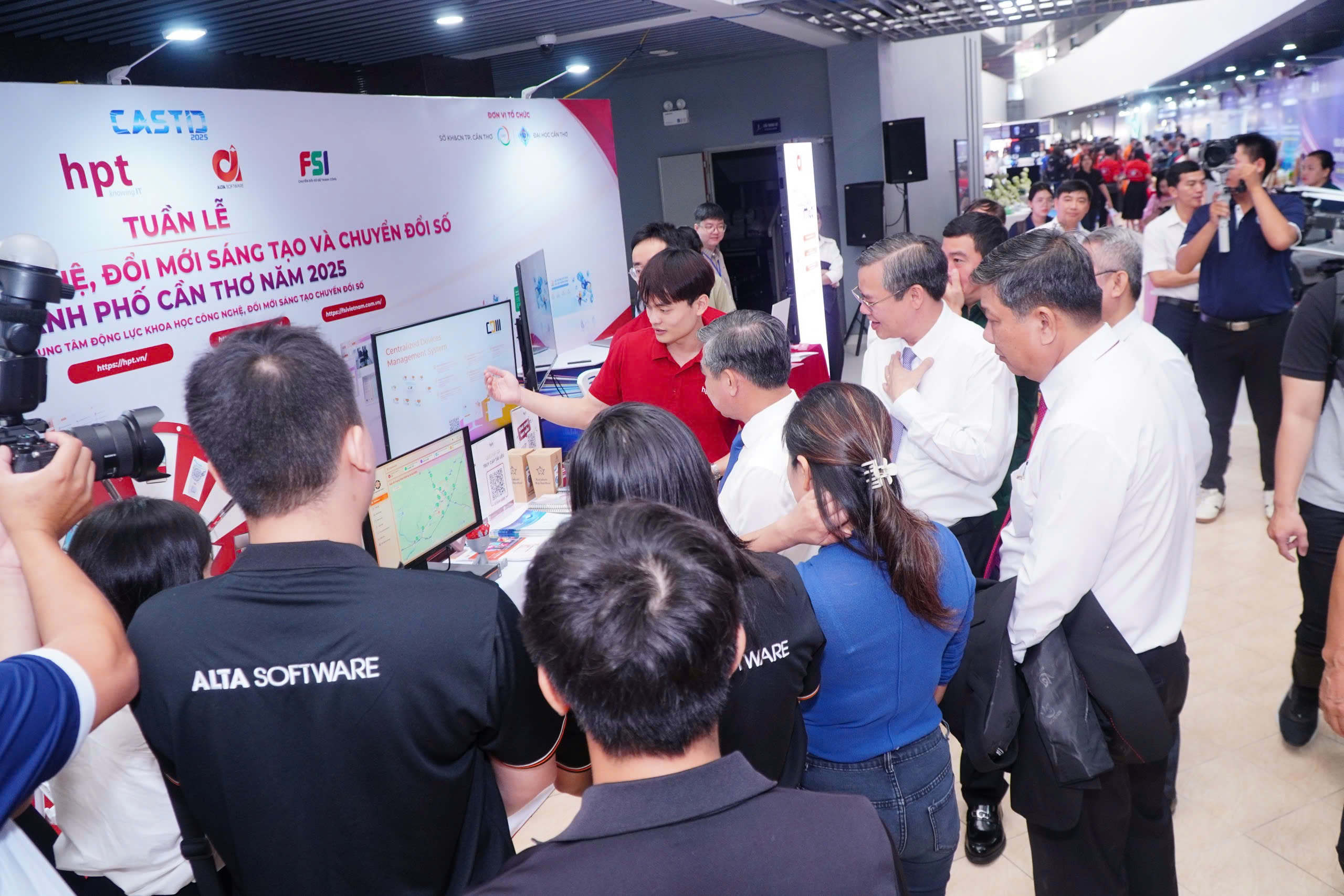 Delegation visiting the HPT booth at CASTID 2025